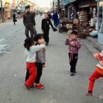 IslBG Children playing a hopscotch game on a Chonju street