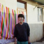IslBG Yo Sun-cha  standing in front of one of the beautiful quilts ubiquitous in Korea.