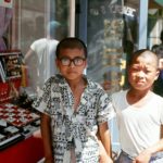 IslBG Two boys in front of a Jewelry store.  I still wear a pin  I bought at this store