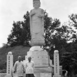 Monks working at a Buddhist temple in Chonju.  I later returned and gave the monk a copy of this picture