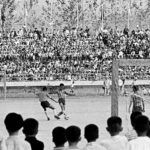 IslBG Students watching an exciting soccer game at a Chonju school